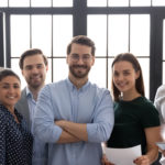 Group portrait of successful multiethnic business team in office